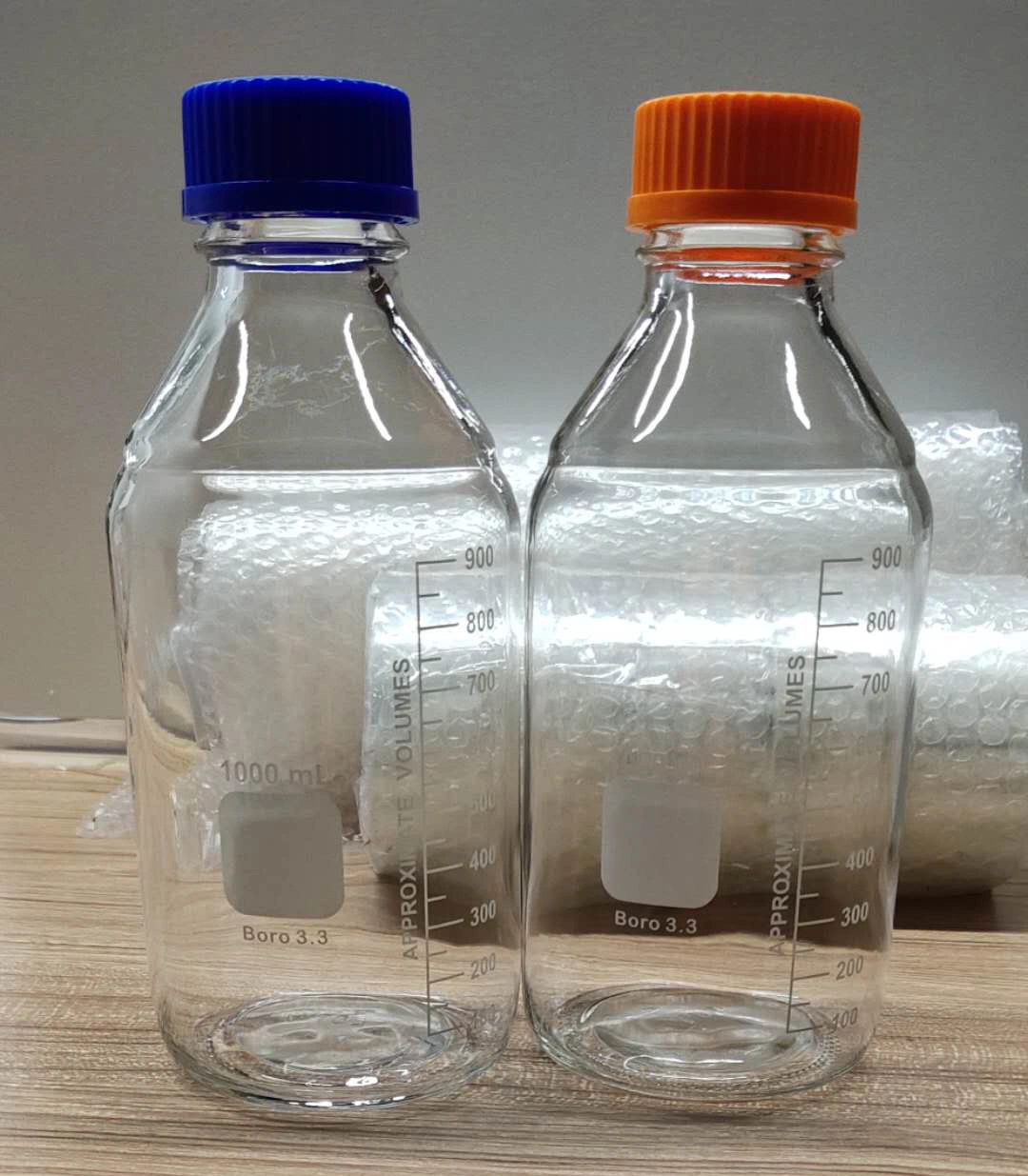 Amber Glass Round Media Storage Bottles with Gl45 Screw Cap Glass Reagent Bottle Wholesale/Supplier