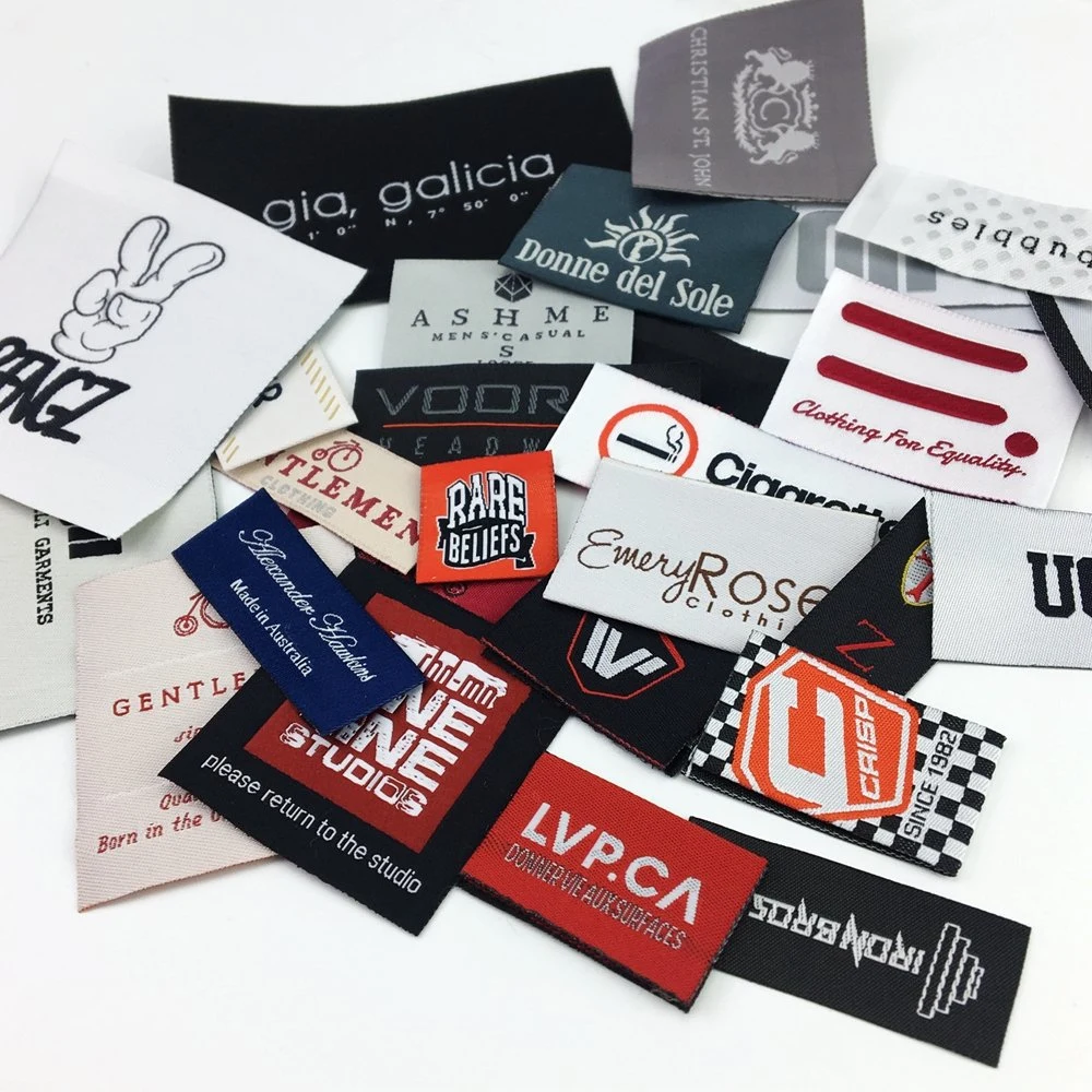 Wholesale/Supplier High quality/High cost performance Custom Waterproof Leather PU Crest Fabric Tags Woven Label for Garment Accessories