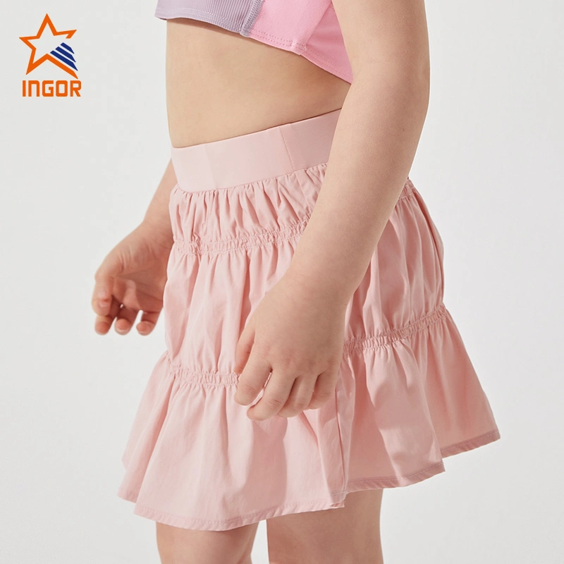 Ingorsports Custom Wholesale/Supplier Kids Skirts with Inner Short Soft Elastic Band Smocking Woven Outer Layer for Kids Sports Fitness Athletic Wear