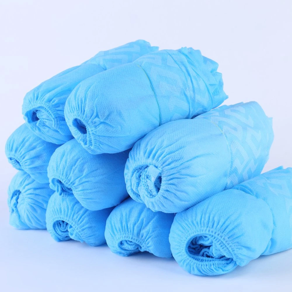 CPE Nonwoven desechables Cubrezapatos Banda elástica a la apertura de varios tamaños resistente al agua líquida y excelente resistencia al desgarro