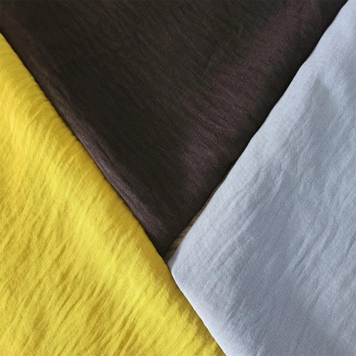 High quality/High cost performance Wholesale/Supplier Textile Comfortable Plain Dyed Crepe Woven 100%Polyester Fabric for Dress and Shirt