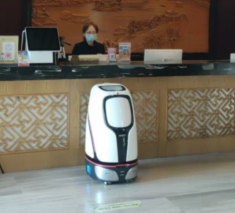 Intelligent Delivery Robot Helps The Delivery Hotel to Welcome Guests and Deliver Goods