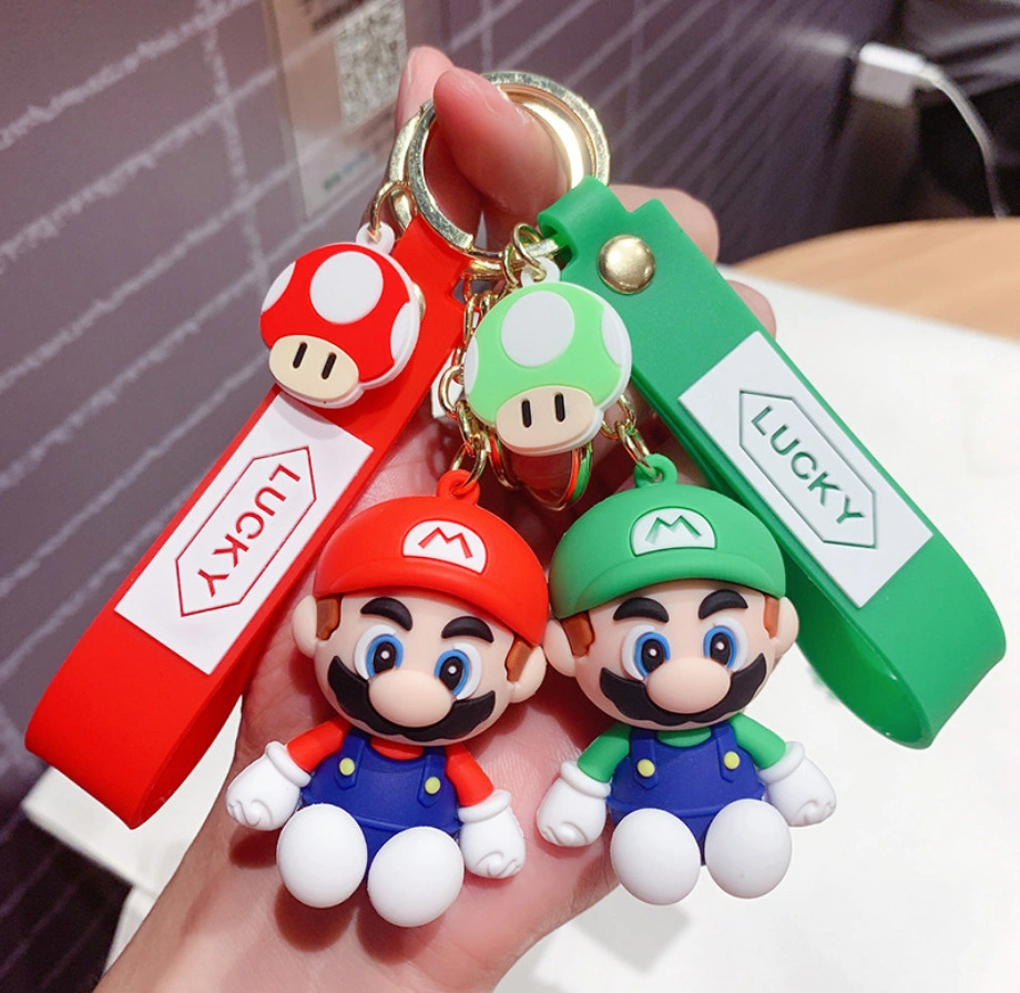 Fábrica al por mayor 3D Kawaii Japón ANIME personajes Juego de Chute Charm Super Mario Bro PVC Cartoon llavero para niñas Colgante Llavero