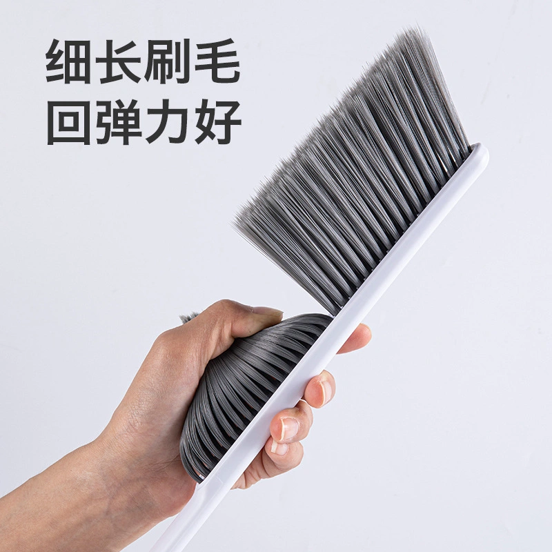 Brosse de dépoussiérage à long manche avec des poils doux pour le nettoyage de la chambre et du canapé.